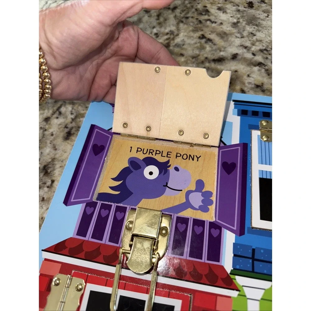 Melissa and Doug Latches Board‎ very cool learning toy by Melissa and Doug